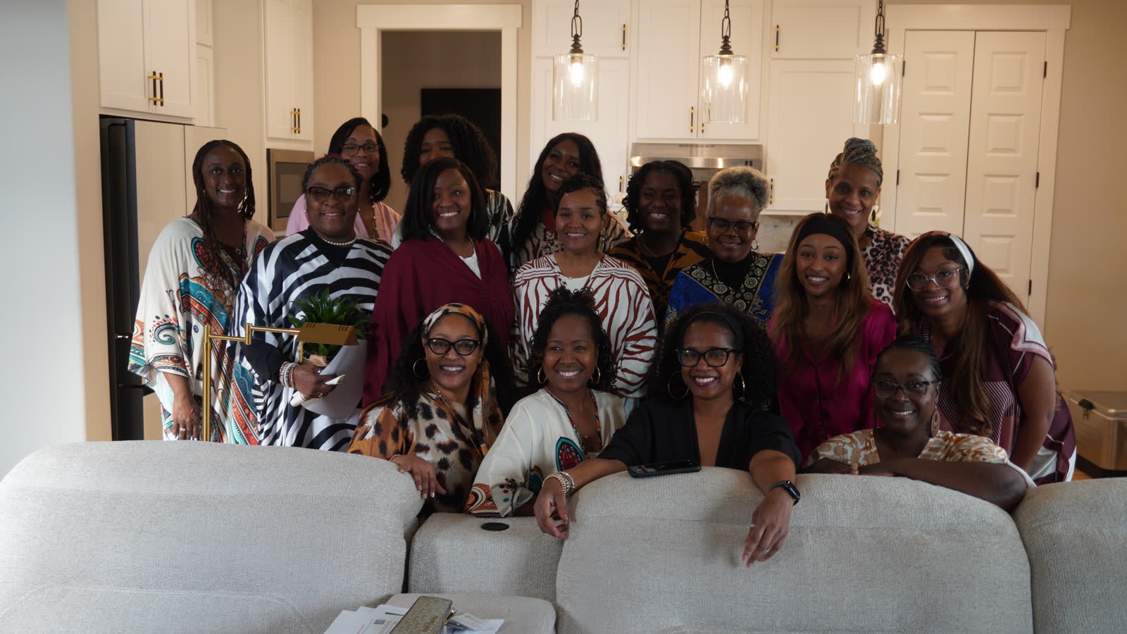 A gathering of professional Black women in a Carmel home — the community Dr. LeSure serves and convenes.